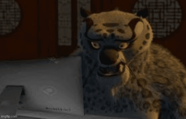 Tai Lung Stares Intensely At Laptop