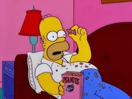 Homer Simpson Eating Peanuts On The Couch
