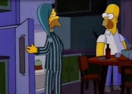 Marge Opens Fridge While Homer Watches Silently